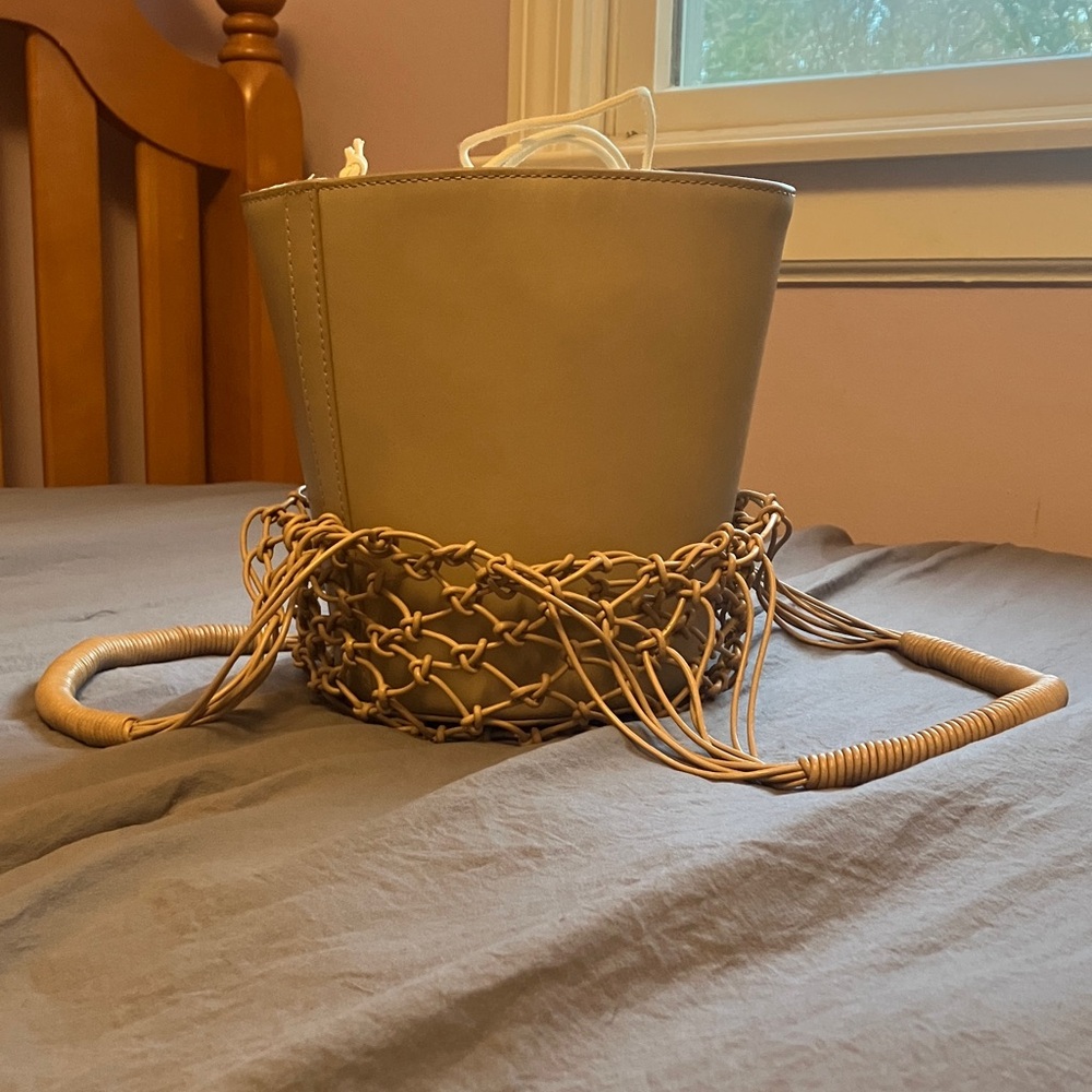 Stylish Tan Bucket Bag with Woven Net Detail